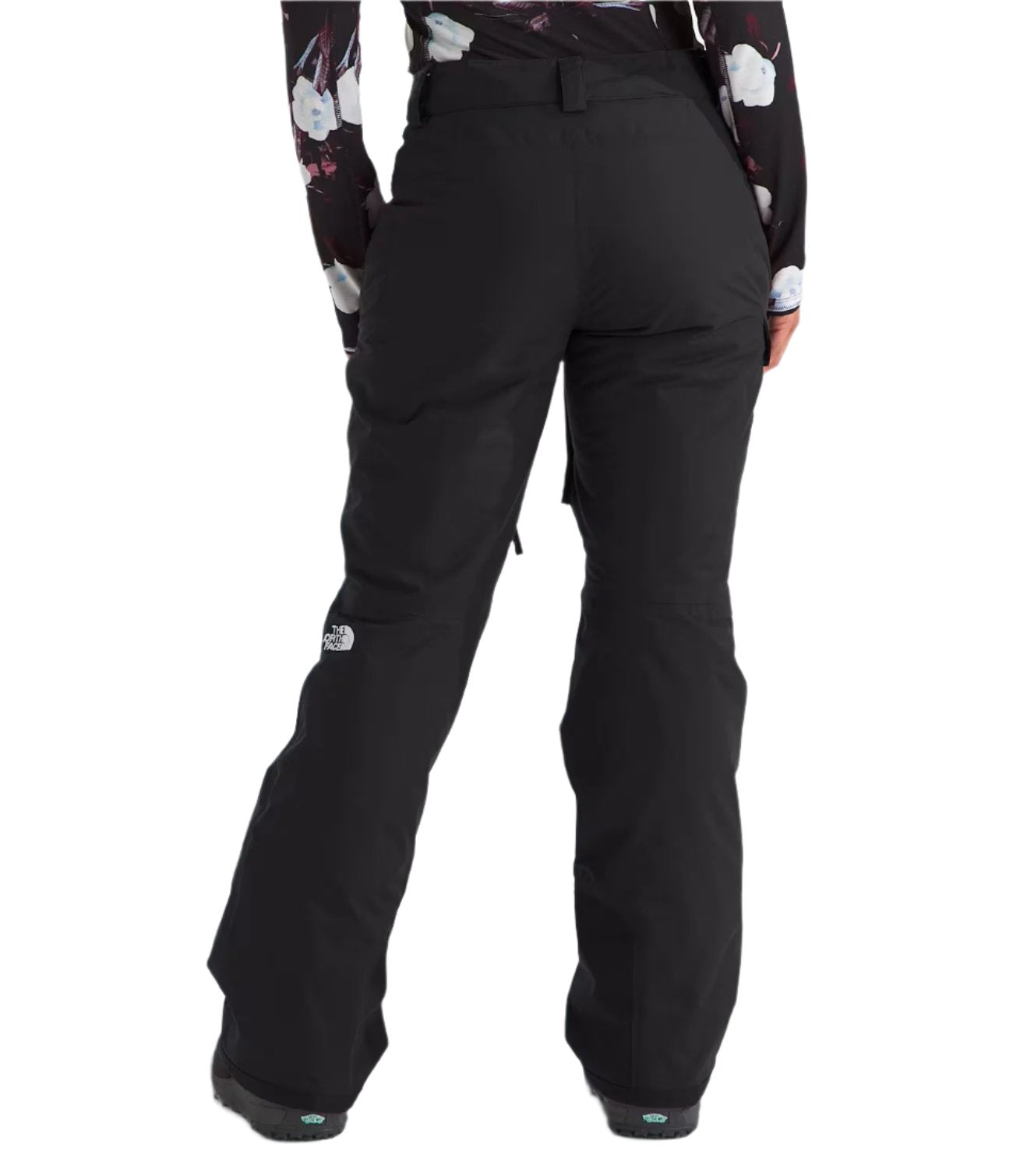 North Face Women's Freedom Insulated Pant 2025 - A pair of black insulated ski pants with a white logo on the left leg.