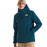 North Face Carto Triclimate Jacket - A dark blue jacket with a white logo on the left chest and a black zipper.