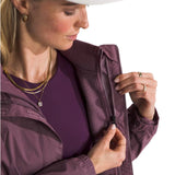 North Face Women's Antora Triclimate Jacket - A purple jacket with a zipper and two pockets on either side, worn by a model in front of a gray background.