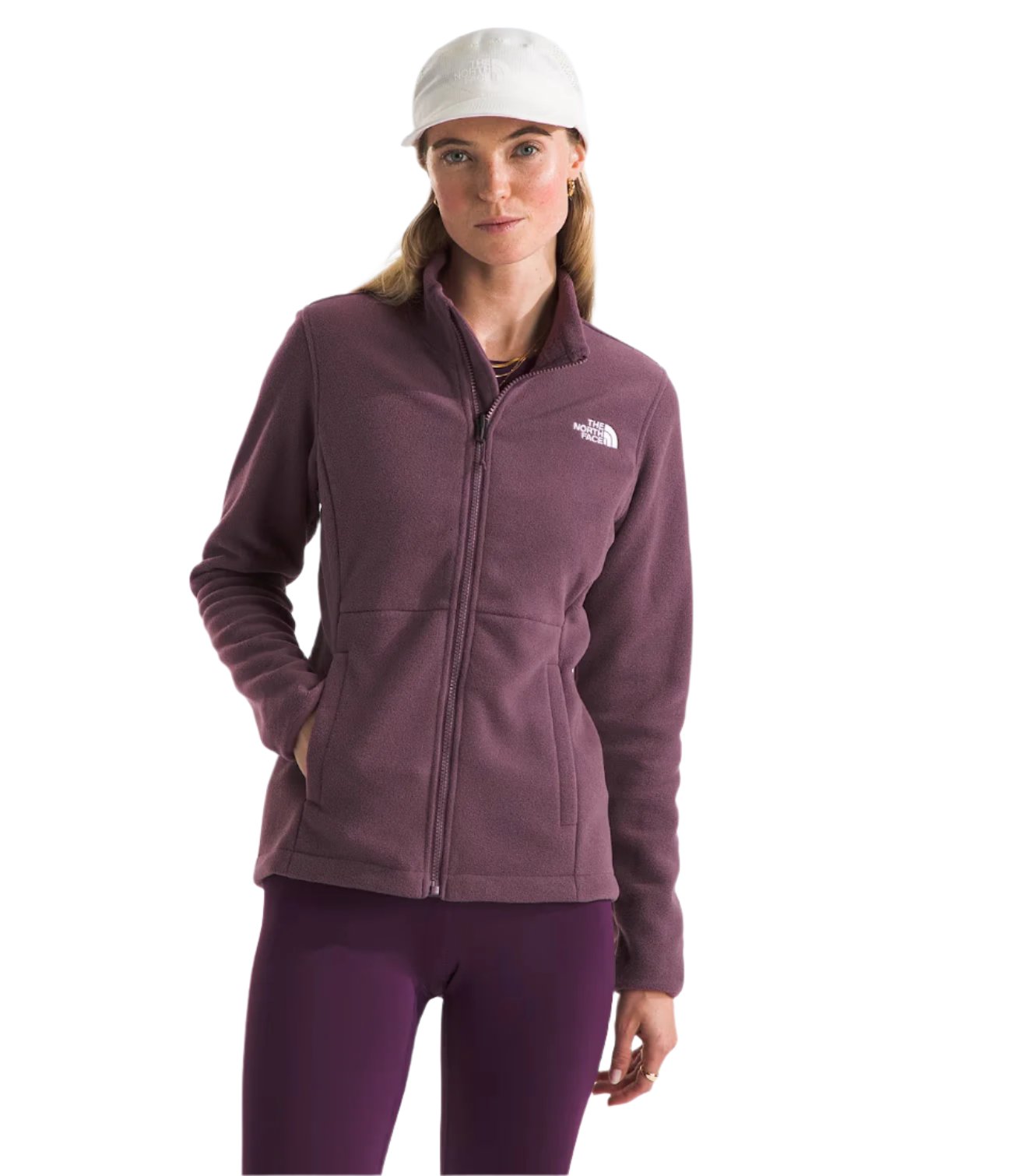 North Face Women's Antora Triclimate Jacket - A woman wearing a purple jacket with a white logo on the left chest, standing against a light gray background.