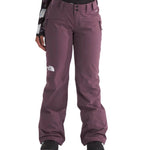 North Face Women's Freedom Stretch Pant 2025 - A pair of women's snow pants with a white logo on the left thigh and a black zipper pocket on the right hip.