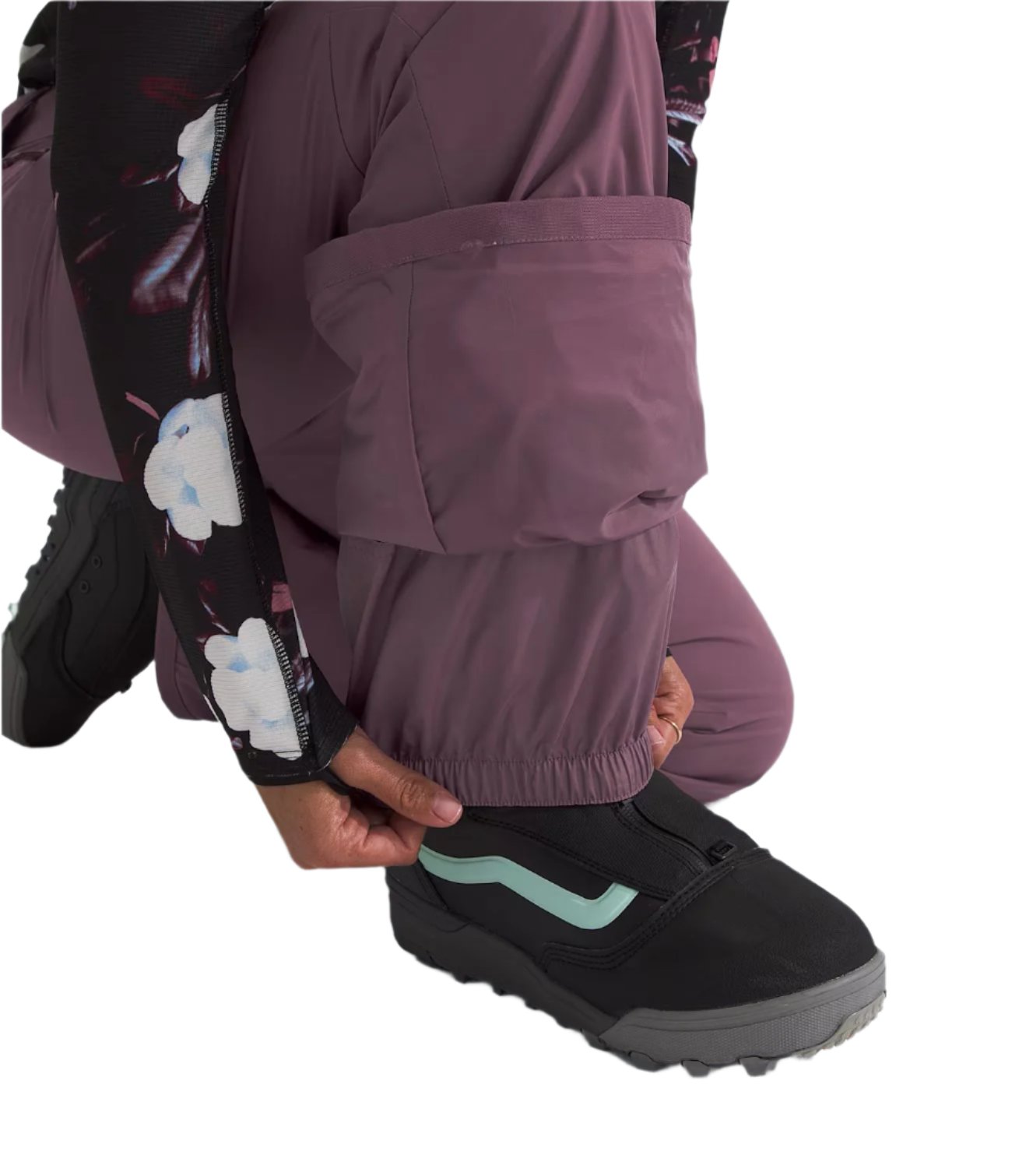 North Face Women's Freedom Stretch Pant 2025 - A pair of black pants with a subtle white pattern and a slight sheen to them, featuring an elastic waistband at the back.