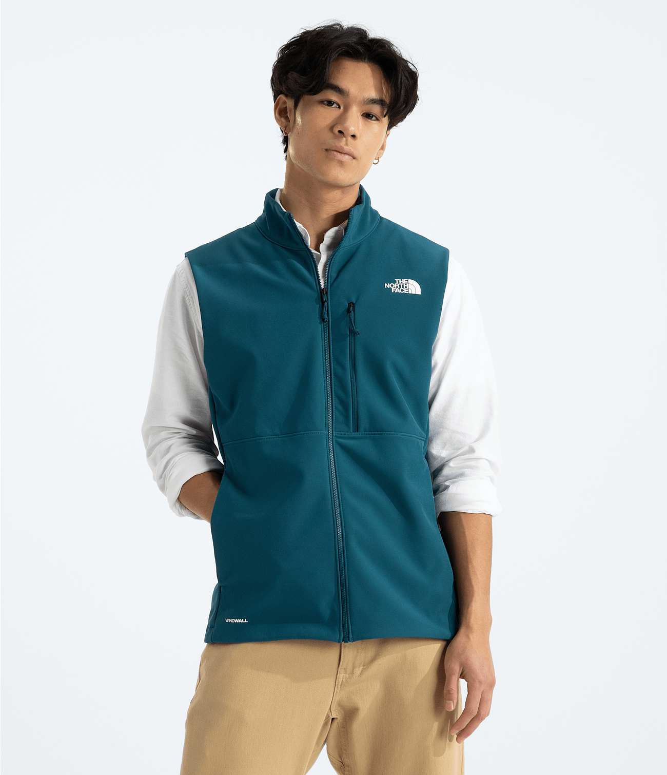 North Face Apex Bionic Vest - A dark teal fleece vest with a zippered front and white logo on the left chest.