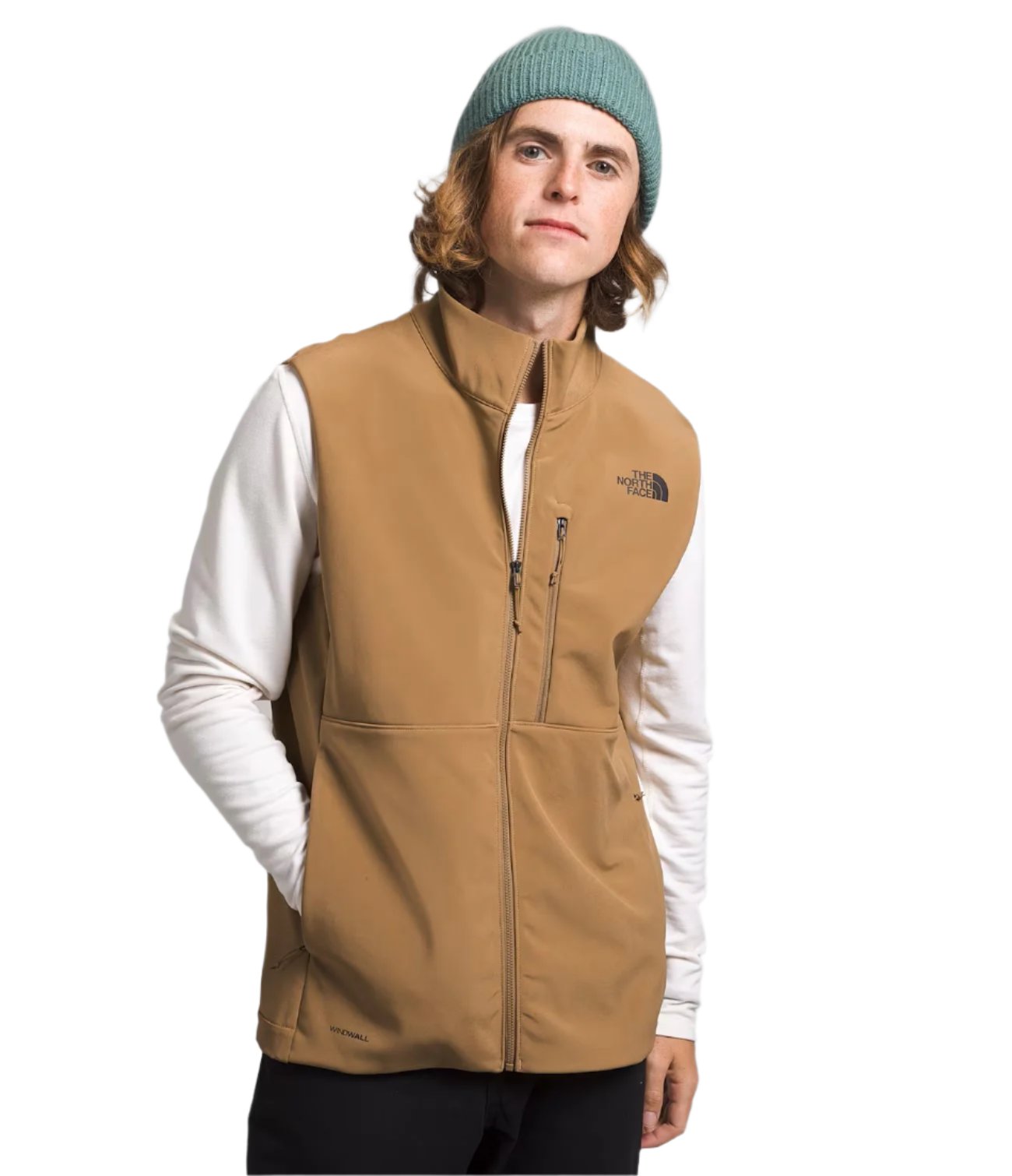 North Face Apex Bionic Vest - A man wearing a tan-colored vest with two zippered pockets on the front, standing against a white background.