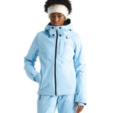North Face Women's Lenado Insulated Jacket - A woman wearing a light blue jacket with black zipper and snap buttons, standing against a white background.