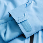 North Face Women's Lenado Insulated Jacket - A light blue jacket with a black zipper and two zippered pockets on either side of the waist.