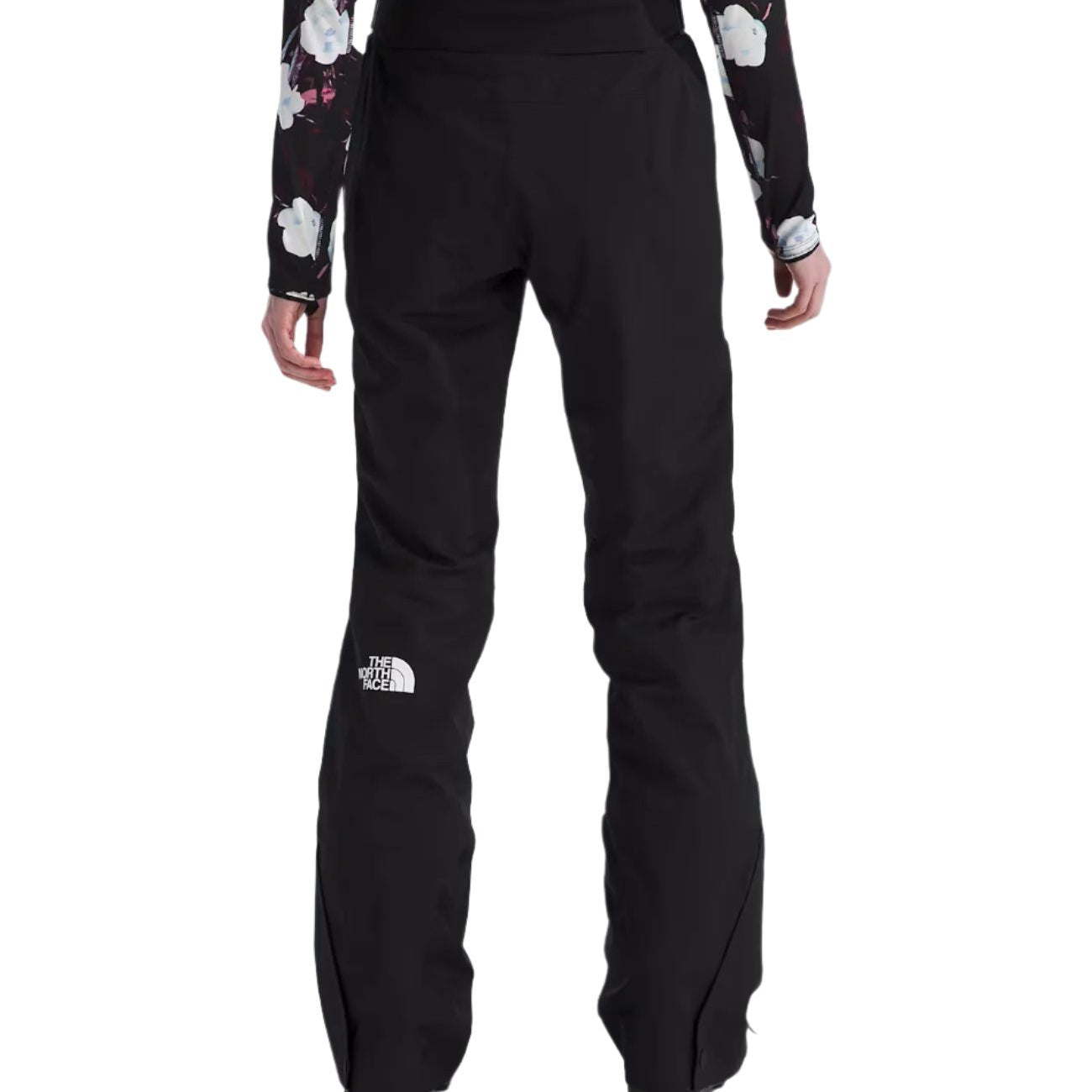 North Face Women's Lenado Insulated Pant - A pair of black insulated ski pants with a white logo on the left leg and a zippered pocket on the right thigh.