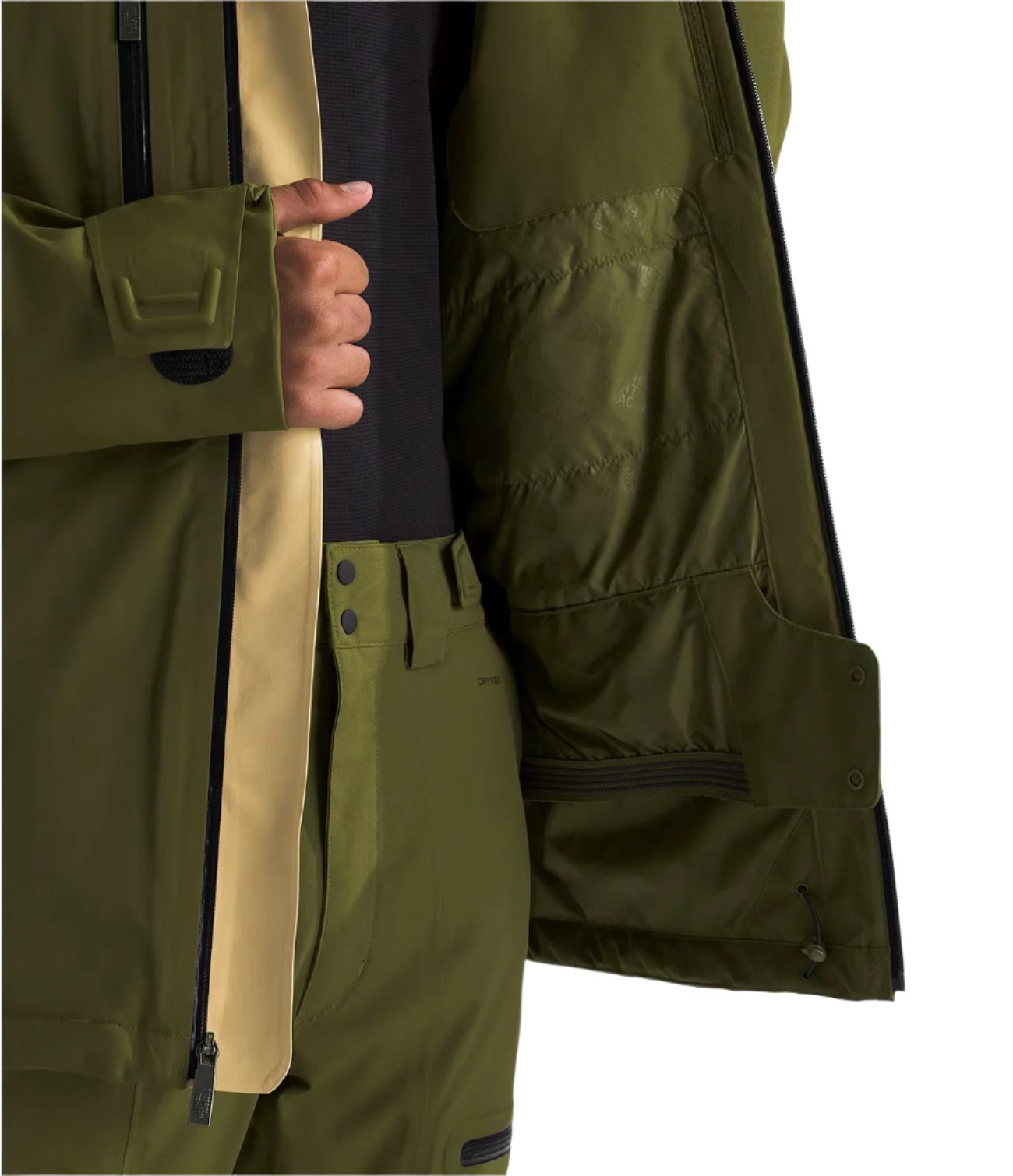 North Face Chakal Insulated Jacket - A dark green jacket with a black zipper and two zippered pockets on the front.