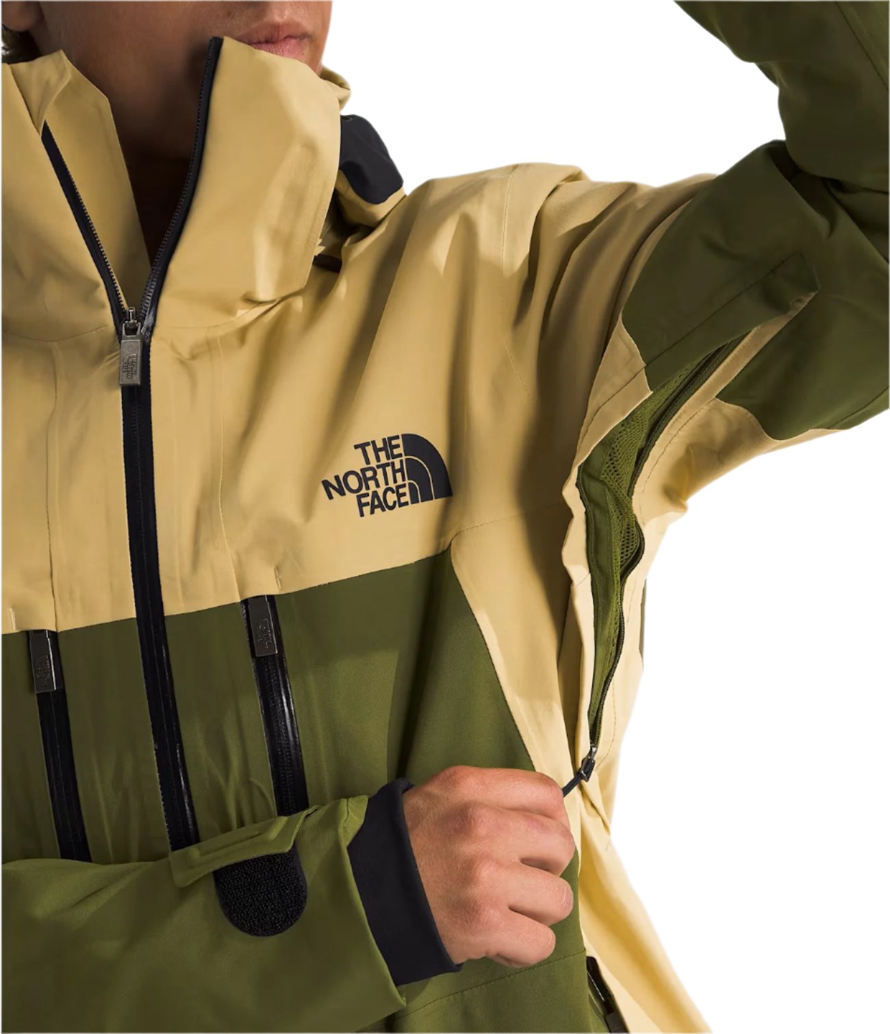 North Face Chakal Insulated Jacket - A tan-colored jacket with a black zipper and logo on the chest.