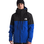 North Face Chakal Insulated Jacket - A black jacket with a blue stripe across the chest and down the sleeves.