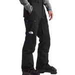 North Face Chakal Insulated Pant - A pair of black insulated pants with a white logo on the left leg.