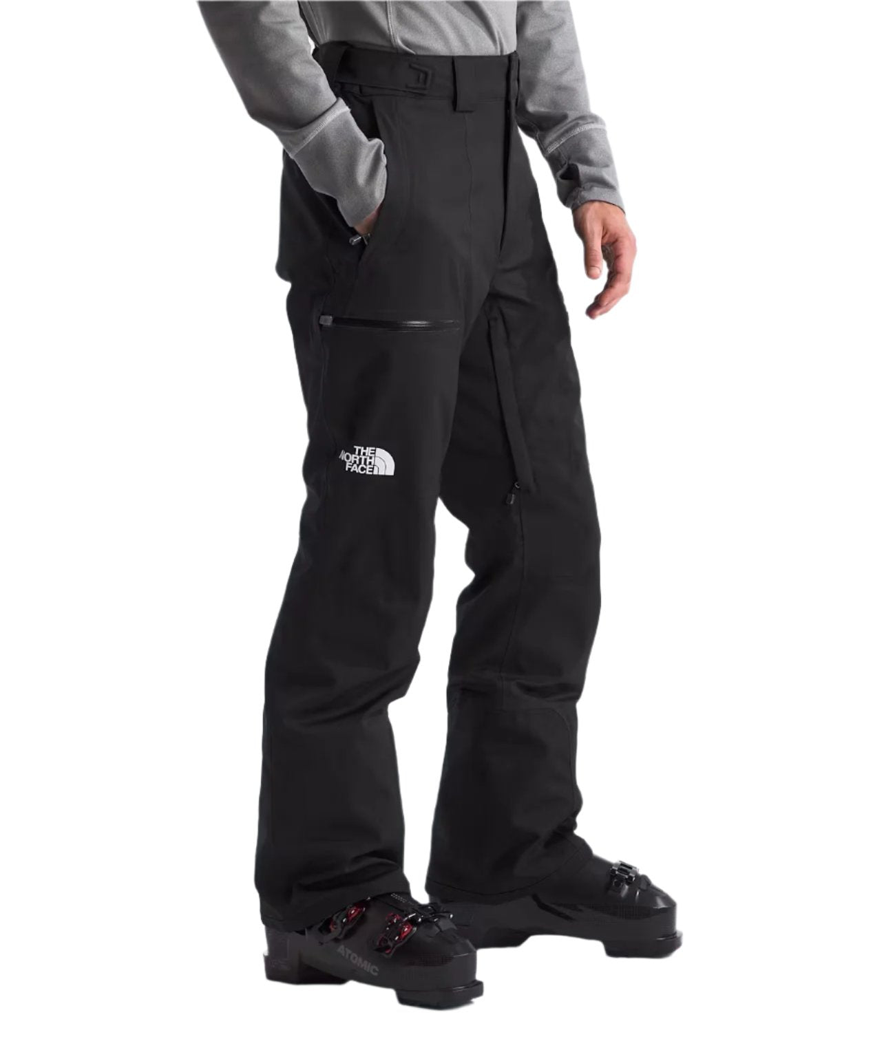 North Face Chakal Insulated Pant Short - A pair of black insulated pants with a white logo on the left thigh and zippered pockets.
