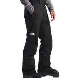 North Face Chakal Insulated Pant Short - A pair of black insulated pants with a white logo on the left thigh and zippered pockets.