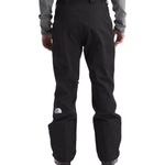 North Face Chakal Insulated Pant Short - A pair of black insulated pants with a white logo on the left leg.