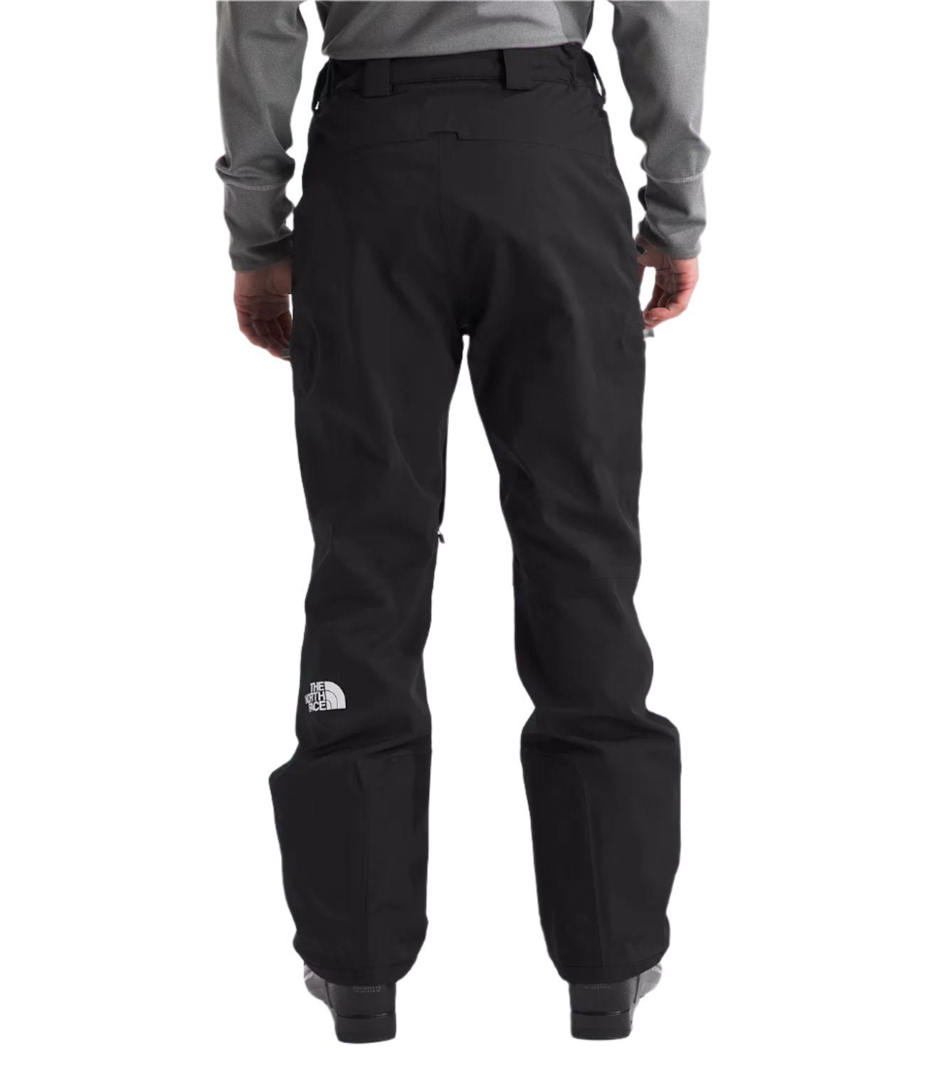 North Face Chakal Insulated Pant Short - A pair of black insulated pants with a white logo on the left leg.
