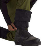 North Face Chakal Insulated Pant Short - A pair of olive green and black insulated pants with a white logo on the left thigh.