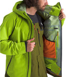 North Face Ceptor Shell Jacket - A bright green jacket with a hood, featuring black zippers and a white logo on the chest.
