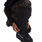 North Face Boys' Freedom Insulated Pant - A pair of black insulated pants with a camouflage pattern on the upper thigh area.
