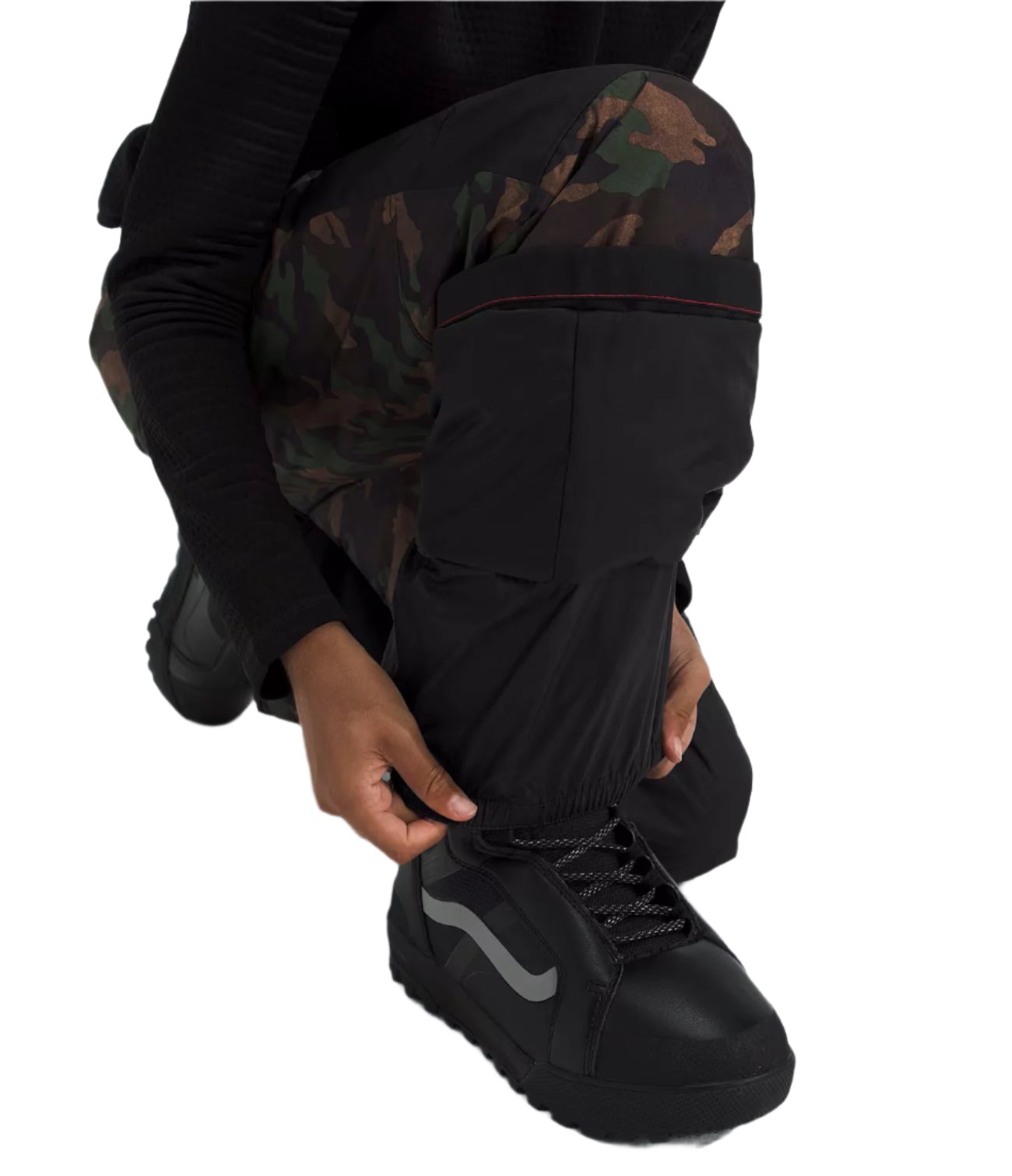 North Face Boys' Freedom Insulated Pant - A pair of black insulated pants with a camouflage pattern on the upper thigh area.