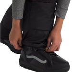North Face Boys' Freedom Insulated Pant - A pair of black insulated pants with a red stripe on the waistband, worn by an adult model.