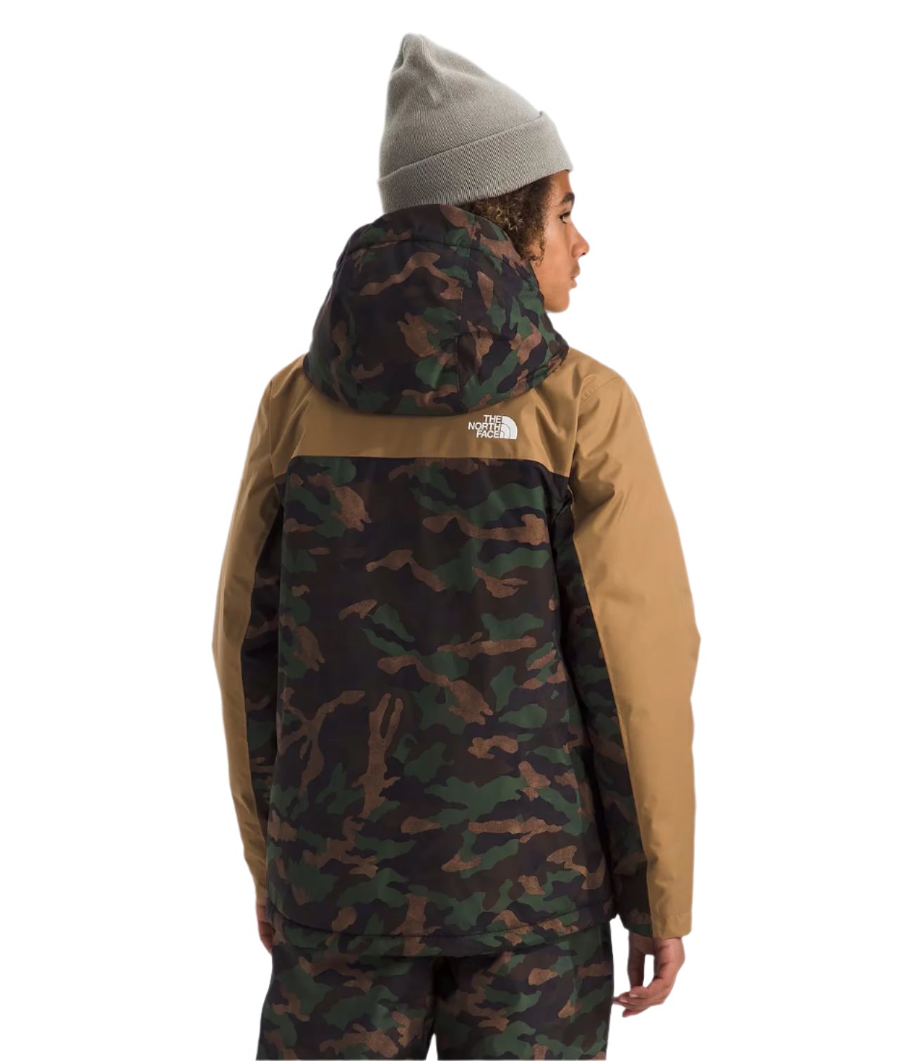 North Face Boys' Freedom Insulated Jacket - A boy wearing a tan and green camouflage jacket with a hood, standing in front of a white background.