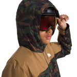 North Face Boys' Freedom Insulated Jacket - A dark green, camouflage-printed jacket with a hood and white logo on the chest.