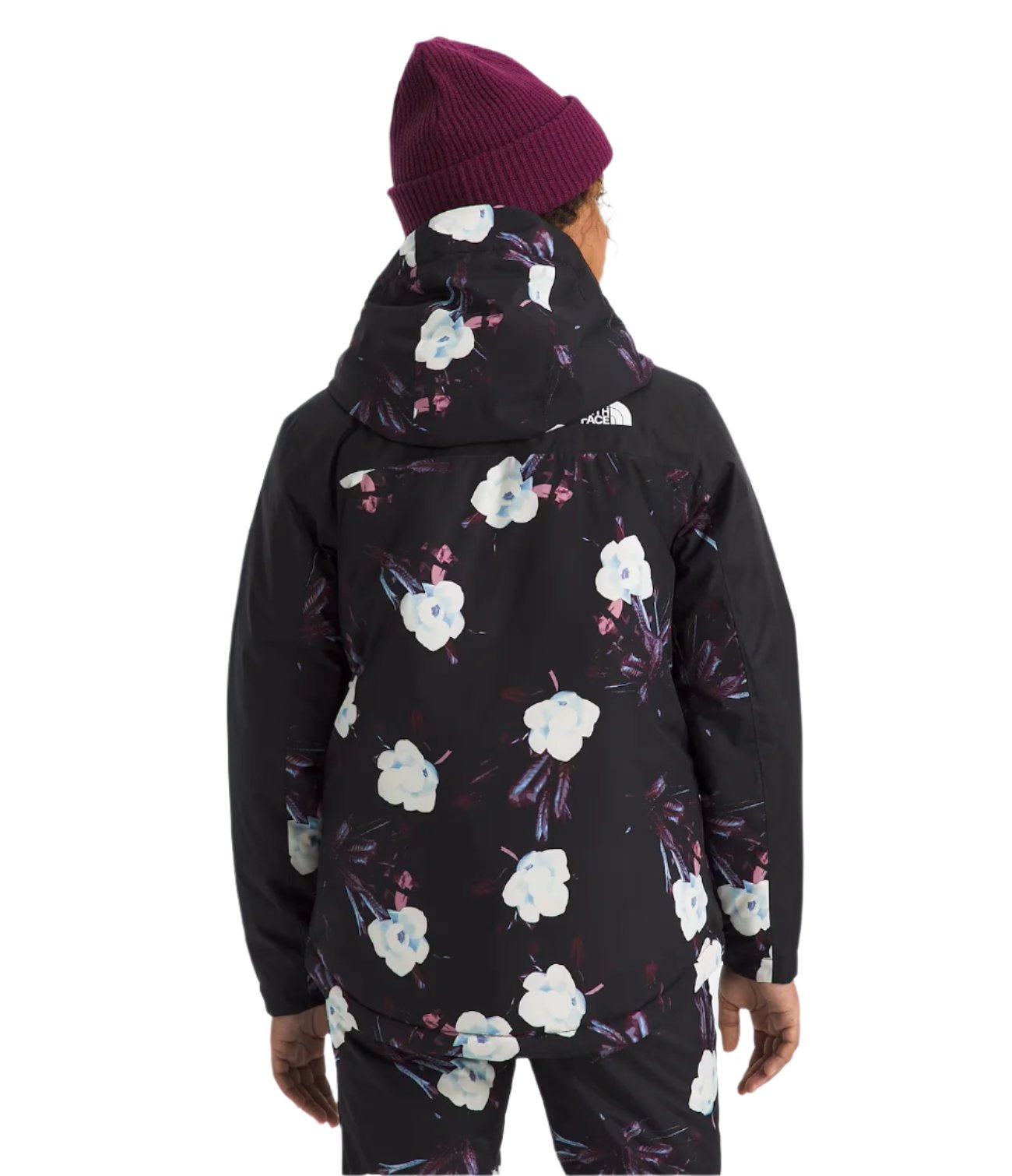 North Face Girls' Freedom Insulated Jacket 2025 - A black jacket with a white floral pattern and blue accents.