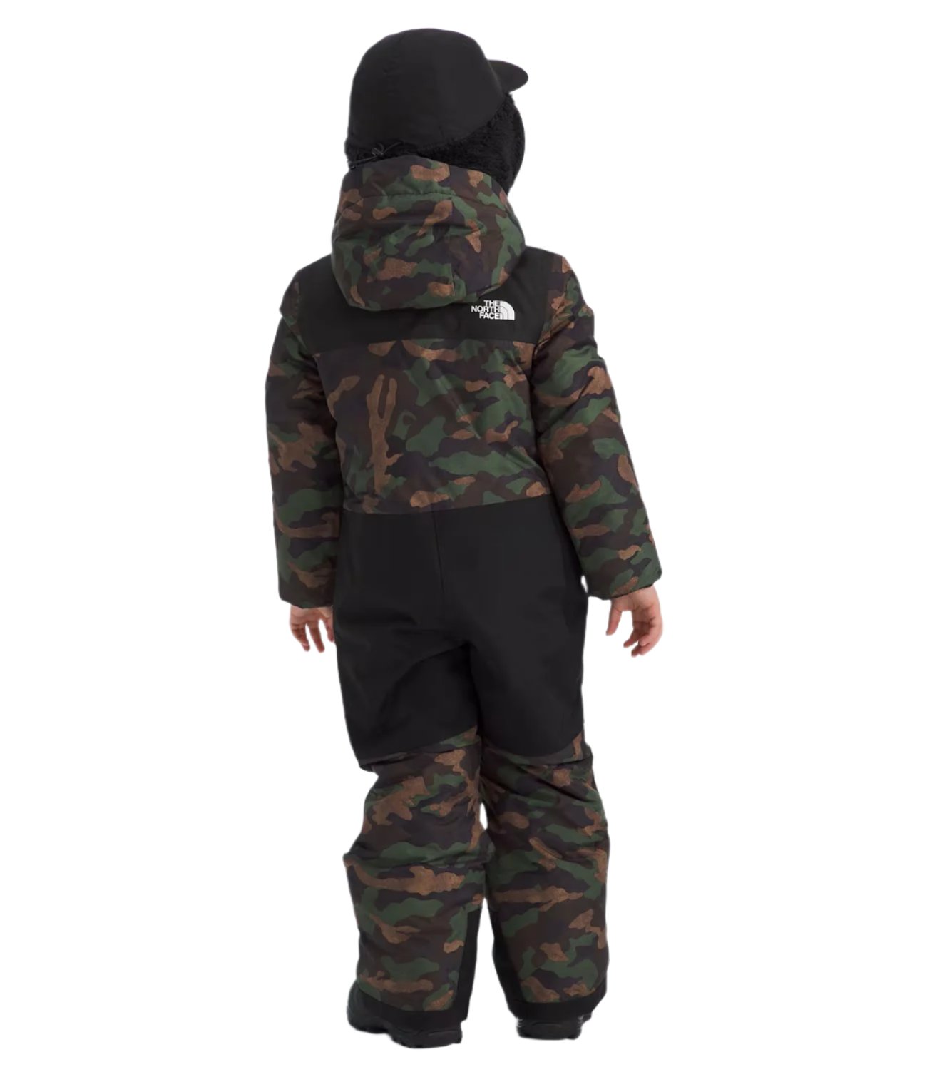 North Face Junior's Freedom Insulated Snow Suit 2025 - A child wearing a camouflage-print snowsuit with black accents and a white logo on the back, facing away from the camera.
