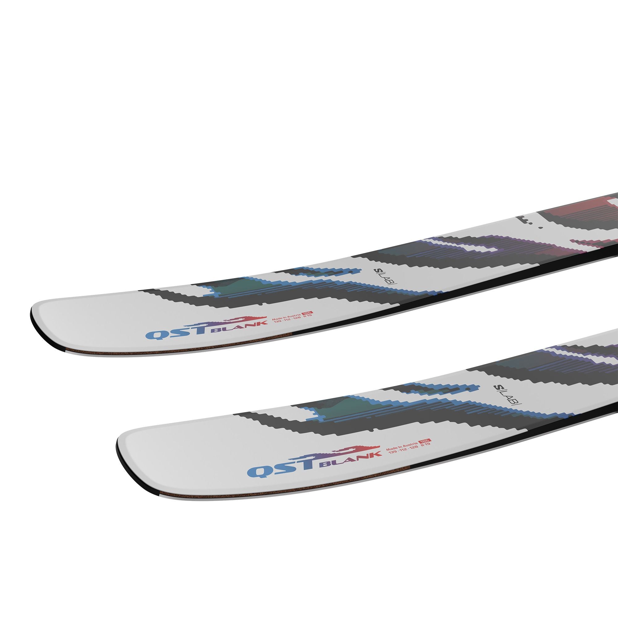 Two pairs of Salomon S/Lab QST Blank skis with white and blue designs, sitting on a white background.