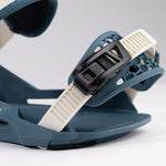 Nidecker Muon-X Bindings 2025 - A pair of blue snowboard bindings with white straps and a black buckle.