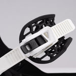 Nidecker Prime Youth Snowboard Bindings 2025 - A pair of black snowboard bindings with white straps and buckles.