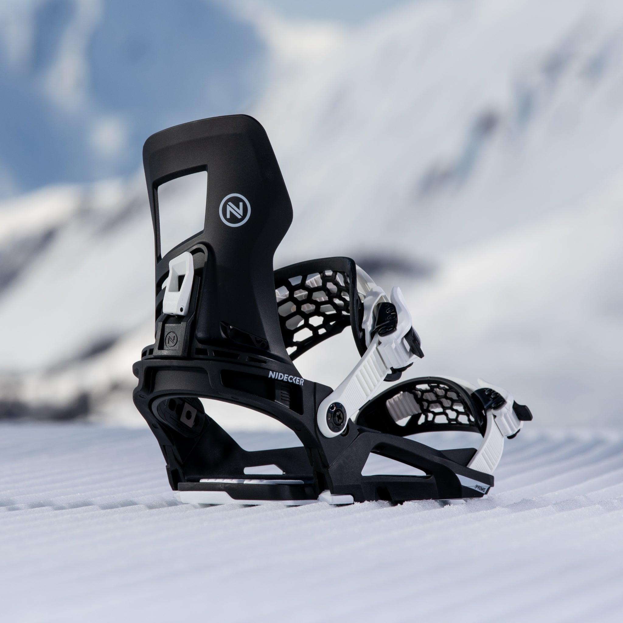 Nidecker Prime Youth Snowboard Bindings 2025 - Black bindings with white buckles and straps on a snowy background.