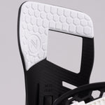 Nidecker Prime Youth Snowboard Bindings 2025 - A black and white snowboard binding with a textured top surface, featuring a circular logo on the left side.