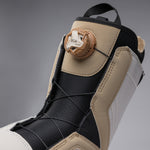 Nidecker Women's Cascade Snowboard Boot 2025 - A tan and black snowboard boot with a white logo on the side, featuring a strap closure system.