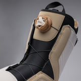 Nidecker Women's Cascade Snowboard Boot 2025 - A tan and black snowboard boot with a white logo on the side, featuring a strap closure system.
