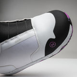 Nidecker Rift Women's Snowboard Boots 2025 - A pair of snowboard boots with a predominantly white upper and purple accents on the heel and toe.
