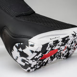 Nidecker Rift APX Men's Snowboard Boots 2025 - Black snowboard boots with a textured pattern on the toe and heel, featuring a white sole with black speckles.