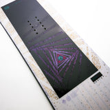 Nidecker Women's Astral Snowboard 2025 - A black snowboard with a purple and pink geometric pattern on its bottom.