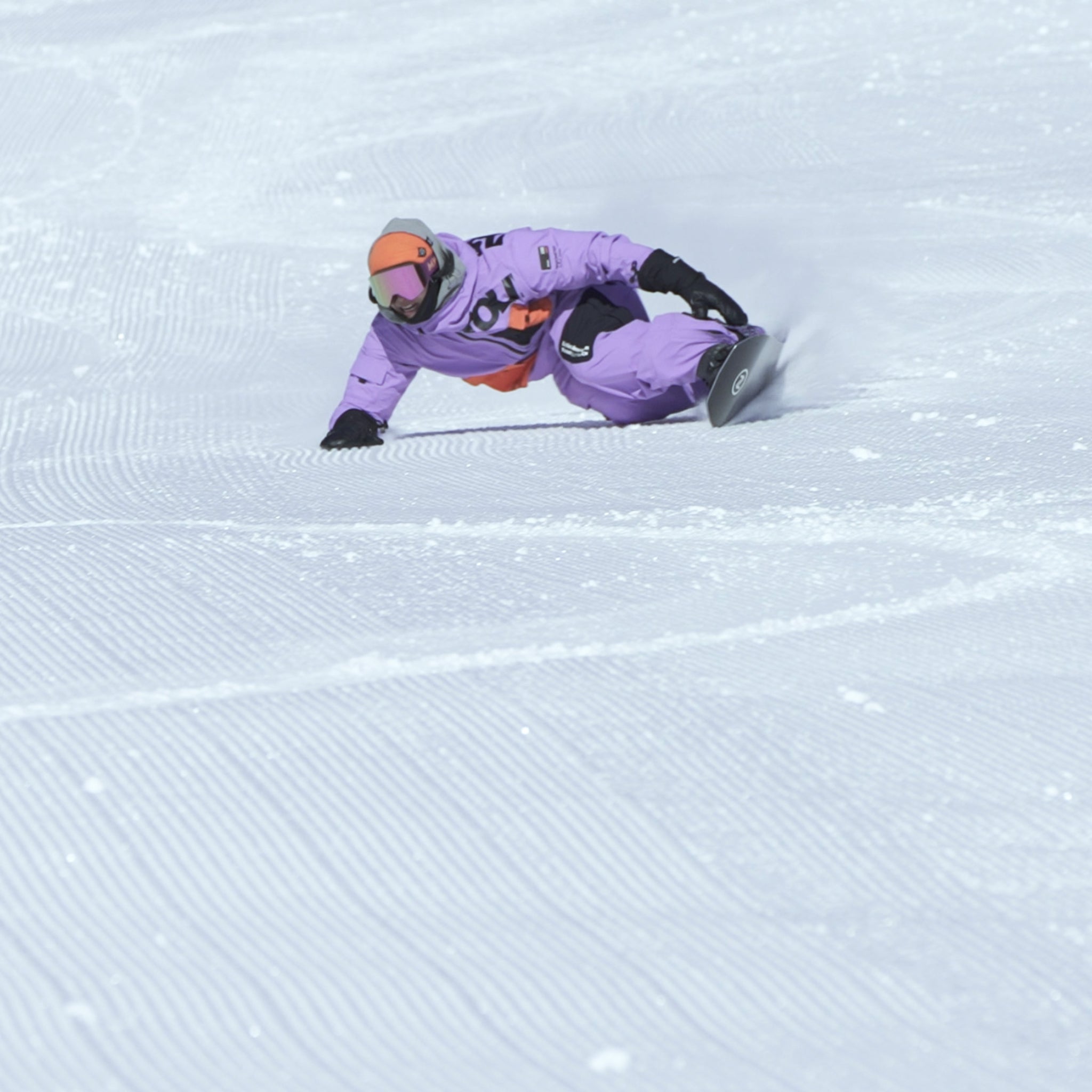 Nidecker Blade Snowboard 2025 - A snowboard with a black base and white lettering, featuring the word "BLADE" on its top side.
