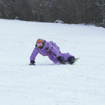 Nidecker Blade Snowboard 2025 - A snowboard with a black base and white lettering, featuring a distinctive "Blade" logo on its top surface.