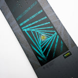 Nidecker Merc Snowboard 2025 - A black snowboard with a blue and yellow geometric pattern on top.