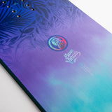 Nidecker Junior's Micron Venus Snowboard 2025 - A snowboard with a purple base and black palm leaf pattern on top.