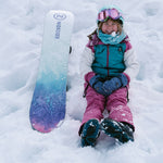 Nidecker Junior's Micron Venus Snowboard 2025 - A snowboard with a blue and pink design, featuring a floral pattern on its bottom.