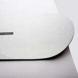 Nidecker Sensor Pro Snowboard 2025 - A white snowboard with a black logo on the top left corner and a small black sticker on the bottom right edge.