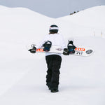 Nidecker Sensor Pro Snowboard 2025 - White snowboard with black bindings and a red logo on top.
