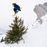 Nidecker Sensor Team Snowboard 2025 - A snowboard with a black base and white accents, featuring a distinctive logo on its top side.