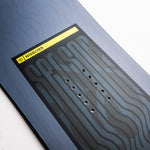 Nidecker Sensor Youth Snowboard 2025 - A navy blue snowboard with a white logo on top and a black stripe at the bottom.