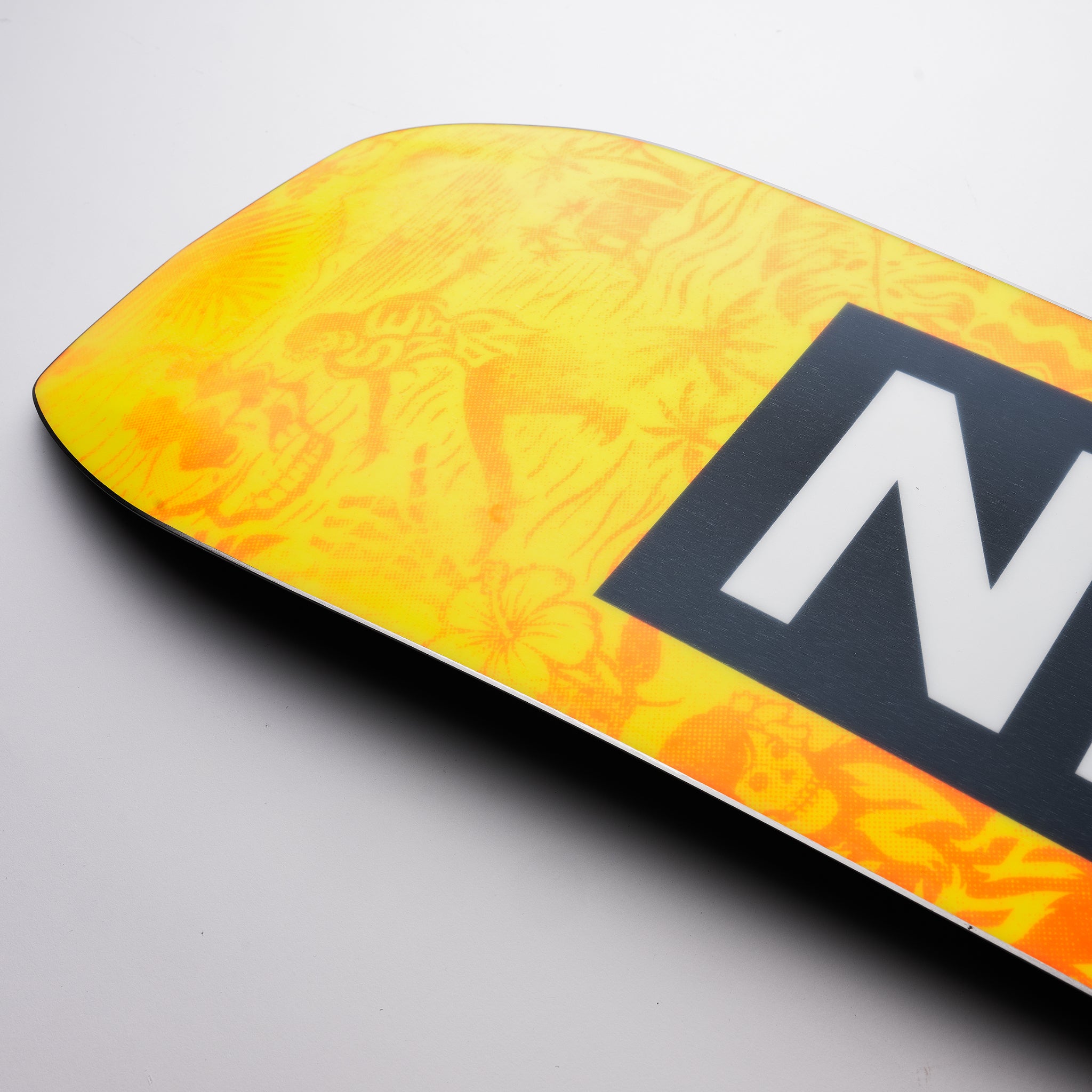 Nidecker Sensor Snowboard 2025 - A yellow snowboard with a black logo featuring a white "N" in a square box.
