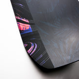 Nidecker Venus Plus Women's Snowboard 2025 - A black snowboard with a pink and blue abstract design on its top side.