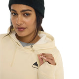 Burton Women's Oak Pullover Hoodie 2025 - A cream-colored hoodie with a black logo featuring a mountain peak and the word "BURTON" in small letters.